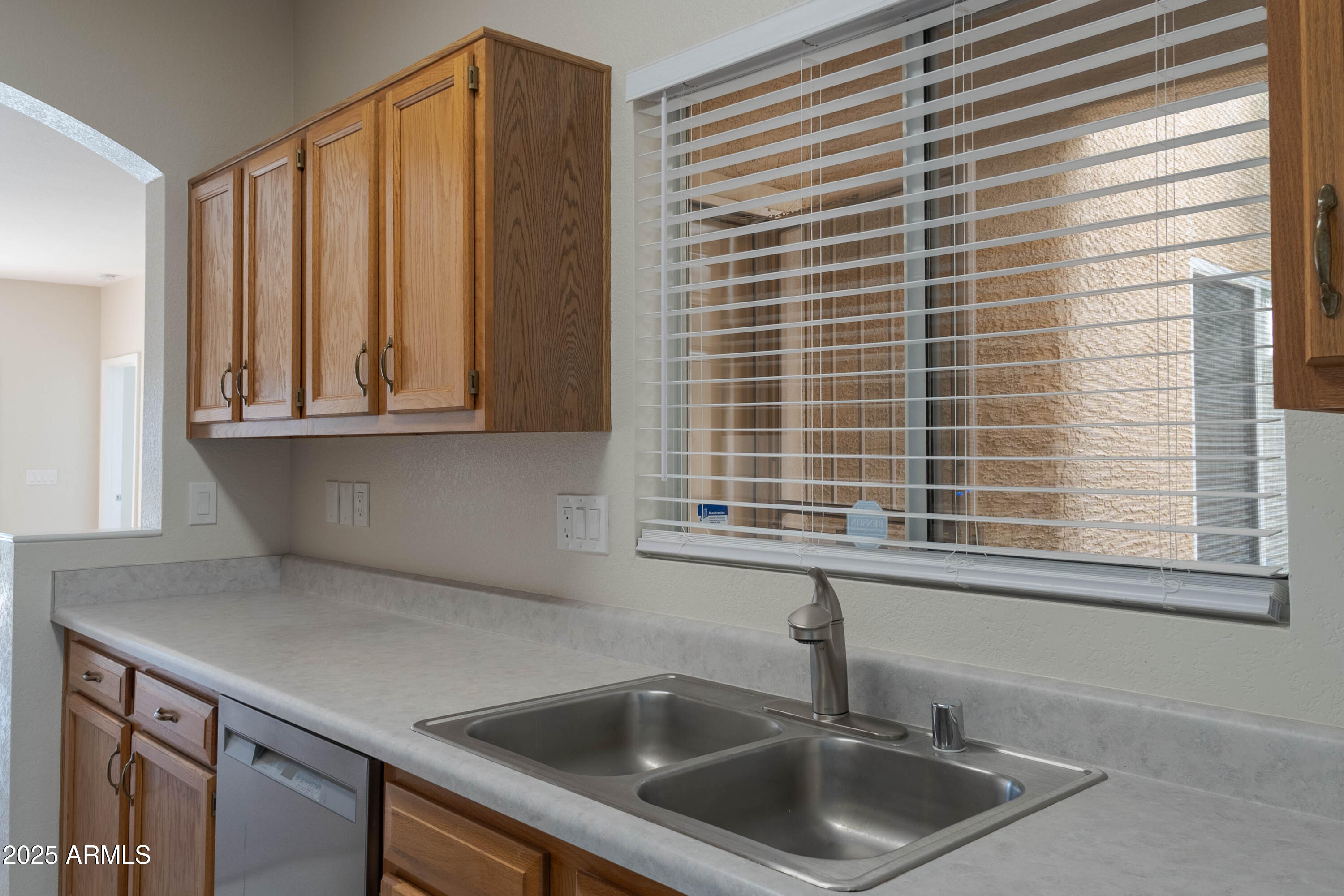 625 North Hamilton Street, Unit 27 Chandler, AZ 85225 - Photo 32 of 40 a kitchen that has a sink and a window