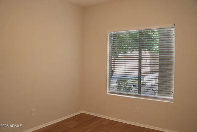 a view of a room that has a window in it