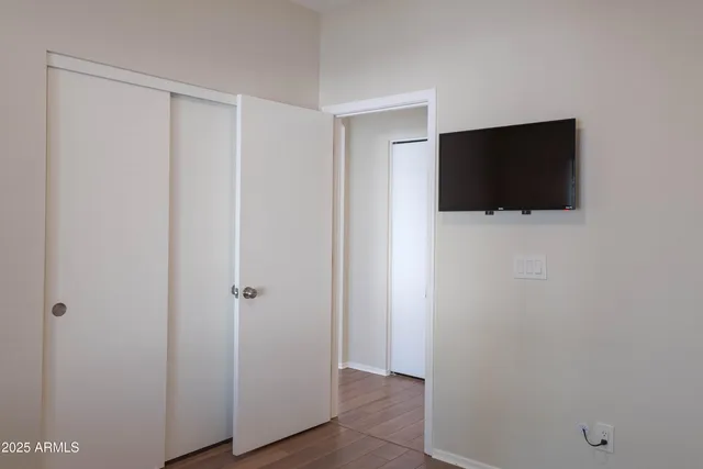 a view of a livingroom with wooden floor