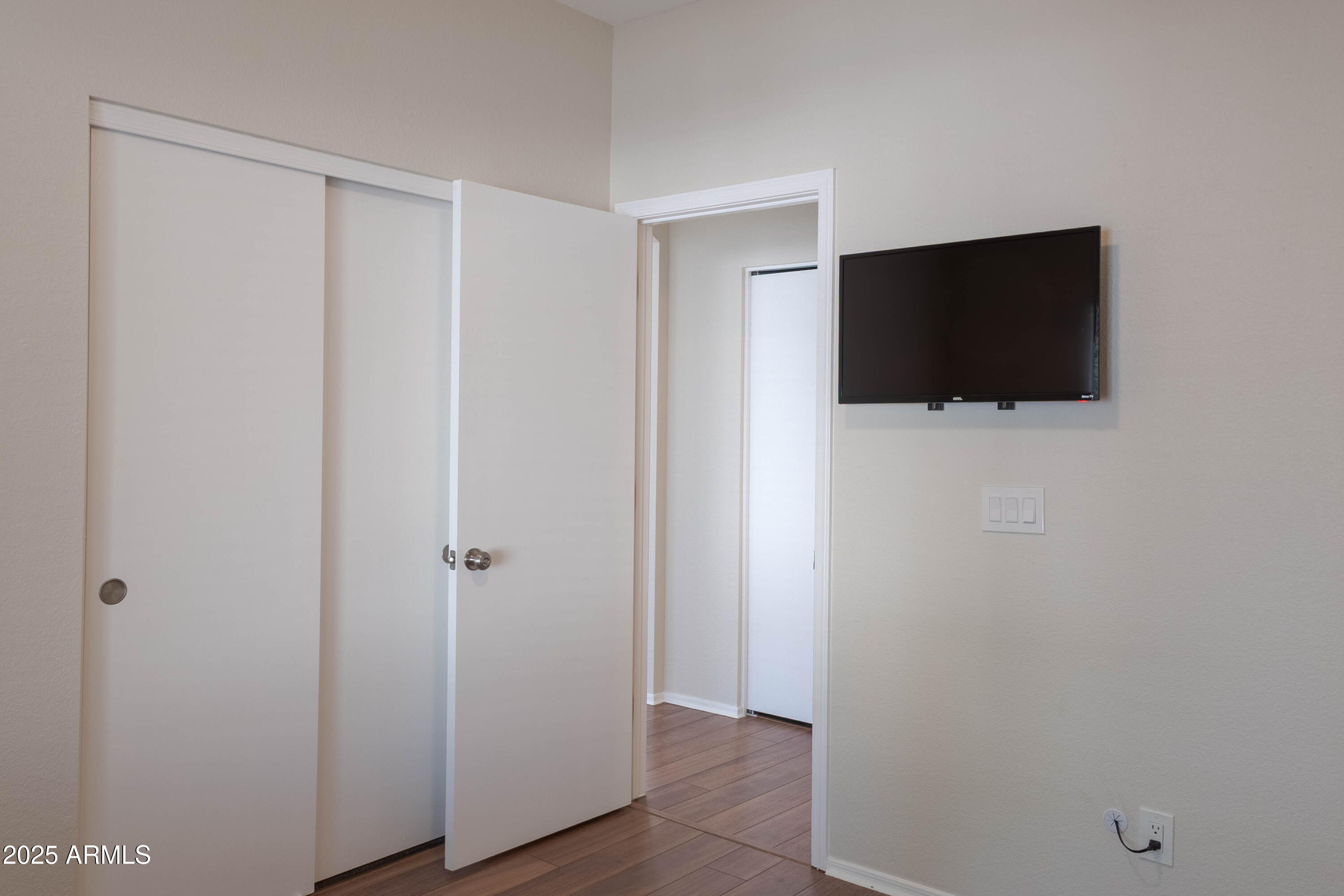 625 North Hamilton Street, Unit 27 Chandler, AZ 85225 - Photo 34 of 40 a view of a livingroom with wooden floor