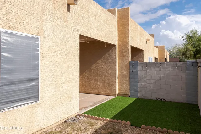 a view of a back yard of the house