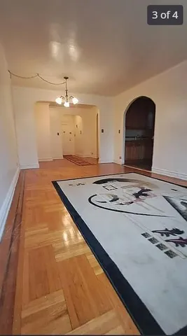 a view of kitchen island with wooden floor