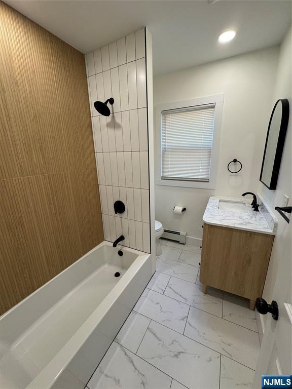 904 Kilsyth Road, Unit 1 Elizabeth, NJ 07208 - Photo 11 of 17 a bathroom with a tub sink and mirror