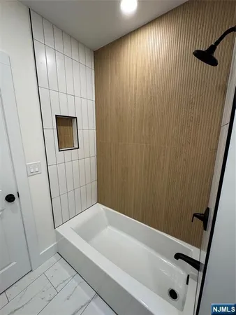a bathroom with a sink and a shower