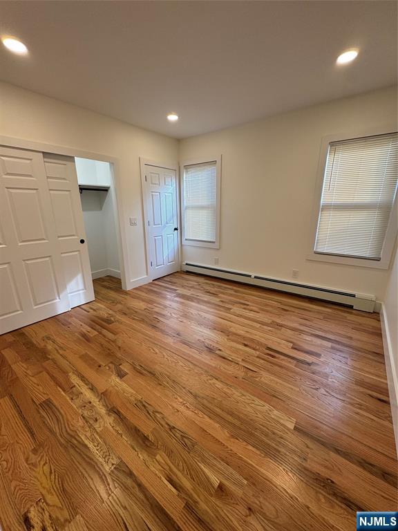 904 Kilsyth Road, Unit 1 Elizabeth, NJ 07208 - Photo 13 of 17 a view of empty room with wooden floor