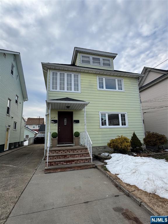 904 Kilsyth Road, Unit 1 Elizabeth, NJ 07208 - Photo 17 of 17 a front view of a house with a yard
