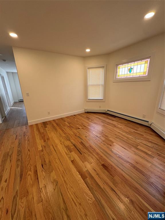 904 Kilsyth Road, Unit 1 Elizabeth, NJ 07208 - Photo 9 of 17 a view of an empty room and wooden floor