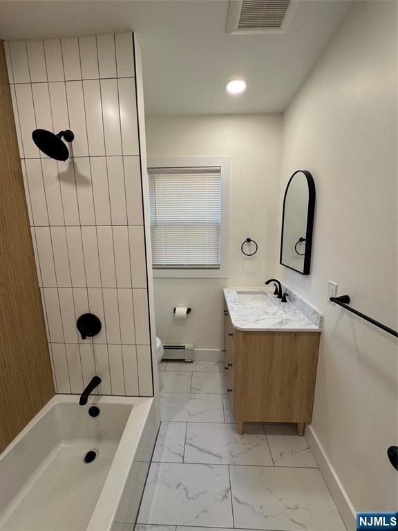 904 Kilsyth Road, Unit 1 Elizabeth, NJ 07208 - Photo 10 of 17 a bathroom with a sink a toilet and shower