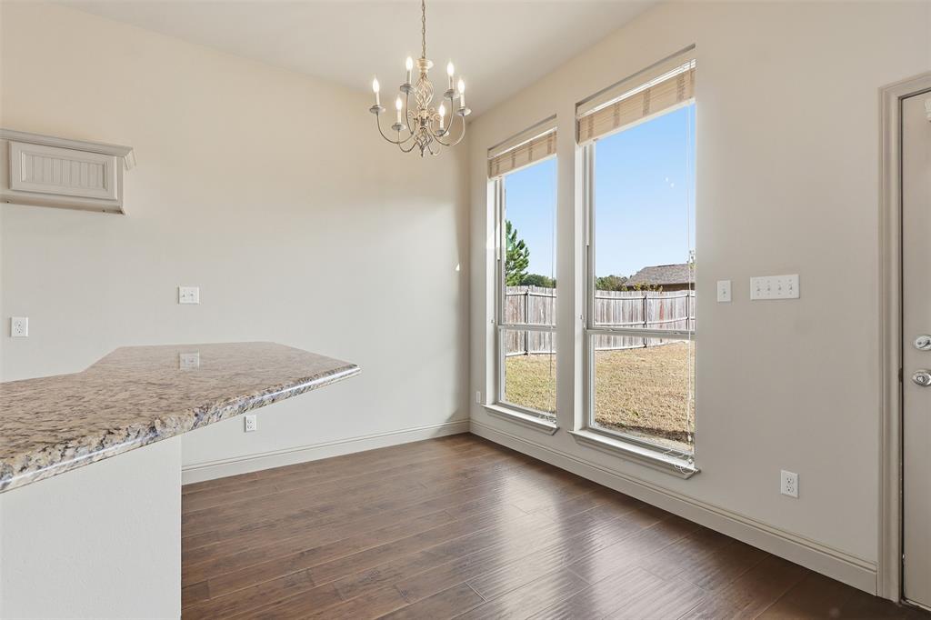 2512 Guinn Farms Road Tyler, TX 75707 - Photo 18 of 29 wooden floor in an empty room with a window