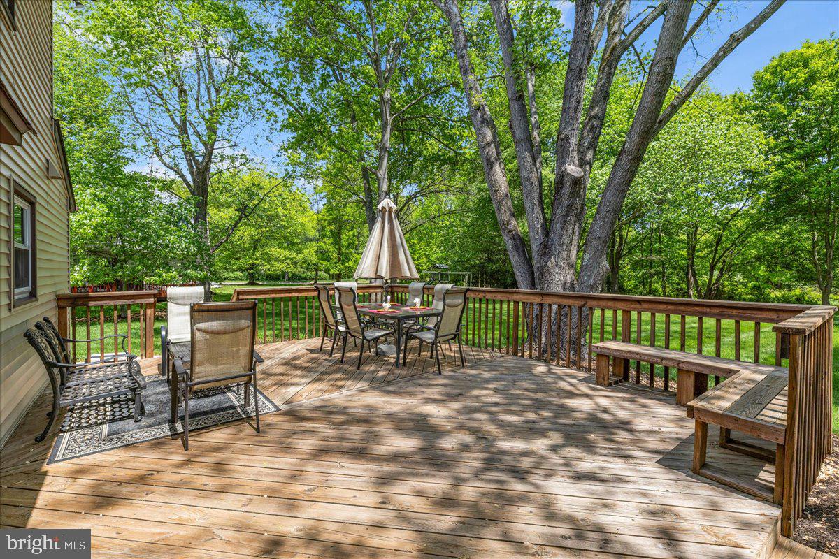 3 Strathmore Place Princeton Junction, NJ 08550 - Photo 26 of 29 a view of a chairs and table on the wooden deck