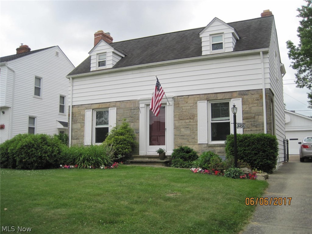 4458 Silsby Road University Heights, OH 44118 - Photo 1 of 19 Pretty perennials around the front of this center hall colonial