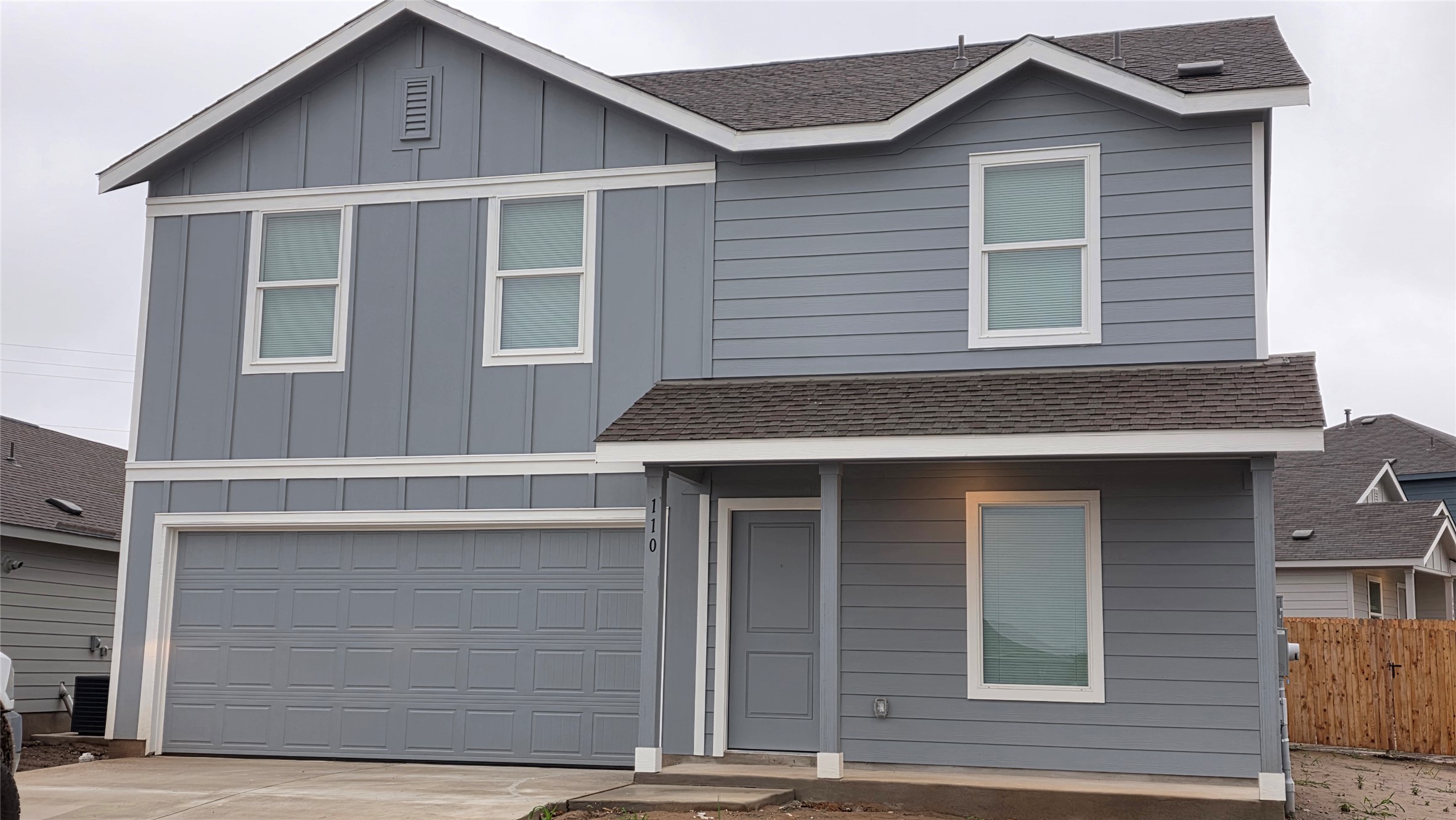 110 Canadian Cove Kyle, TX 78640 - Photo 1 of 20 a front view of a house with garage