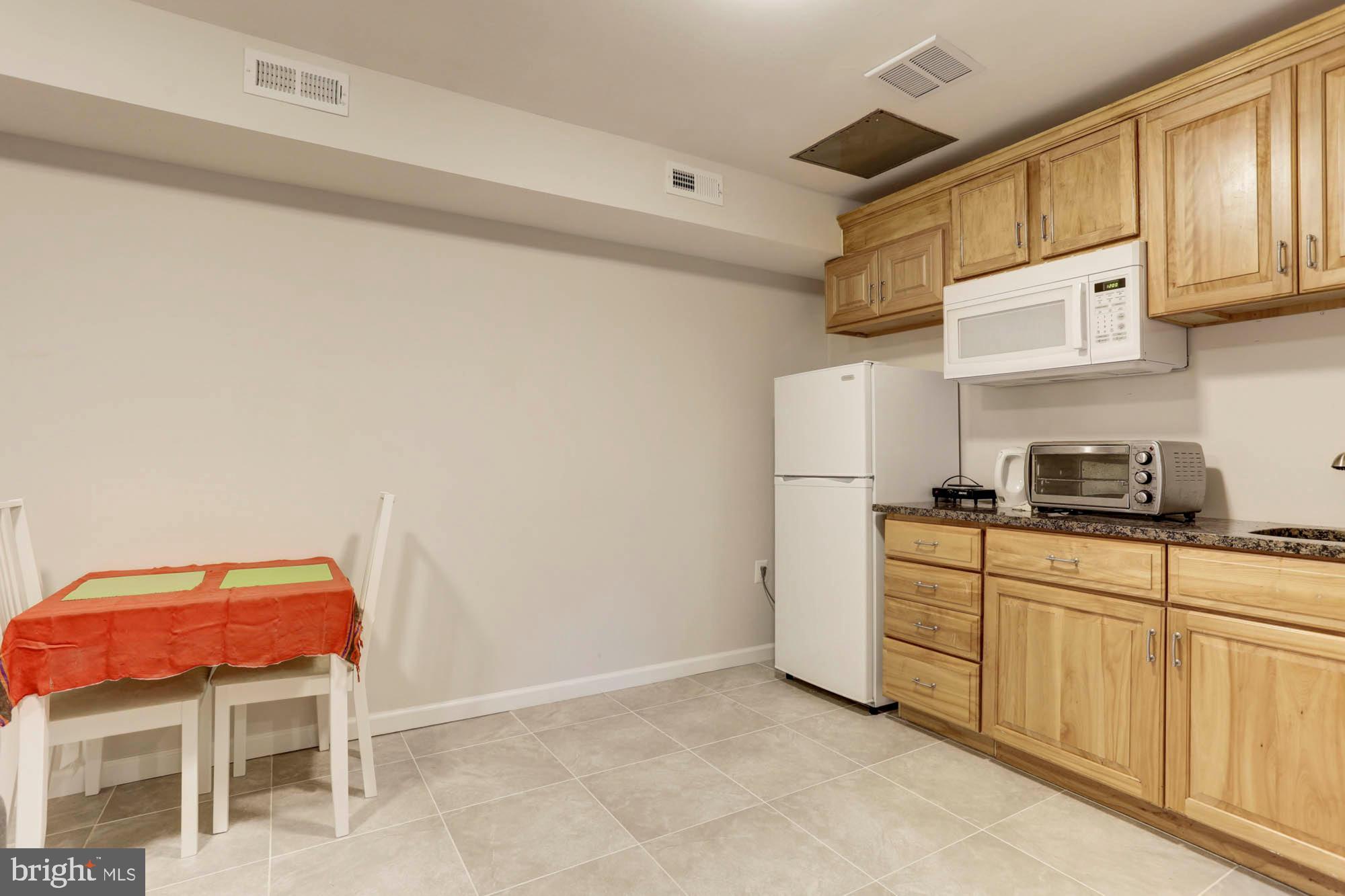 8012 Sandy Spring Road Laurel, MD 20707 - Photo 25 of 36 Basement - Kitchen