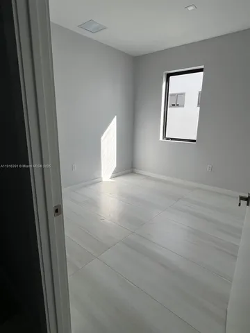 a view of empty room with window