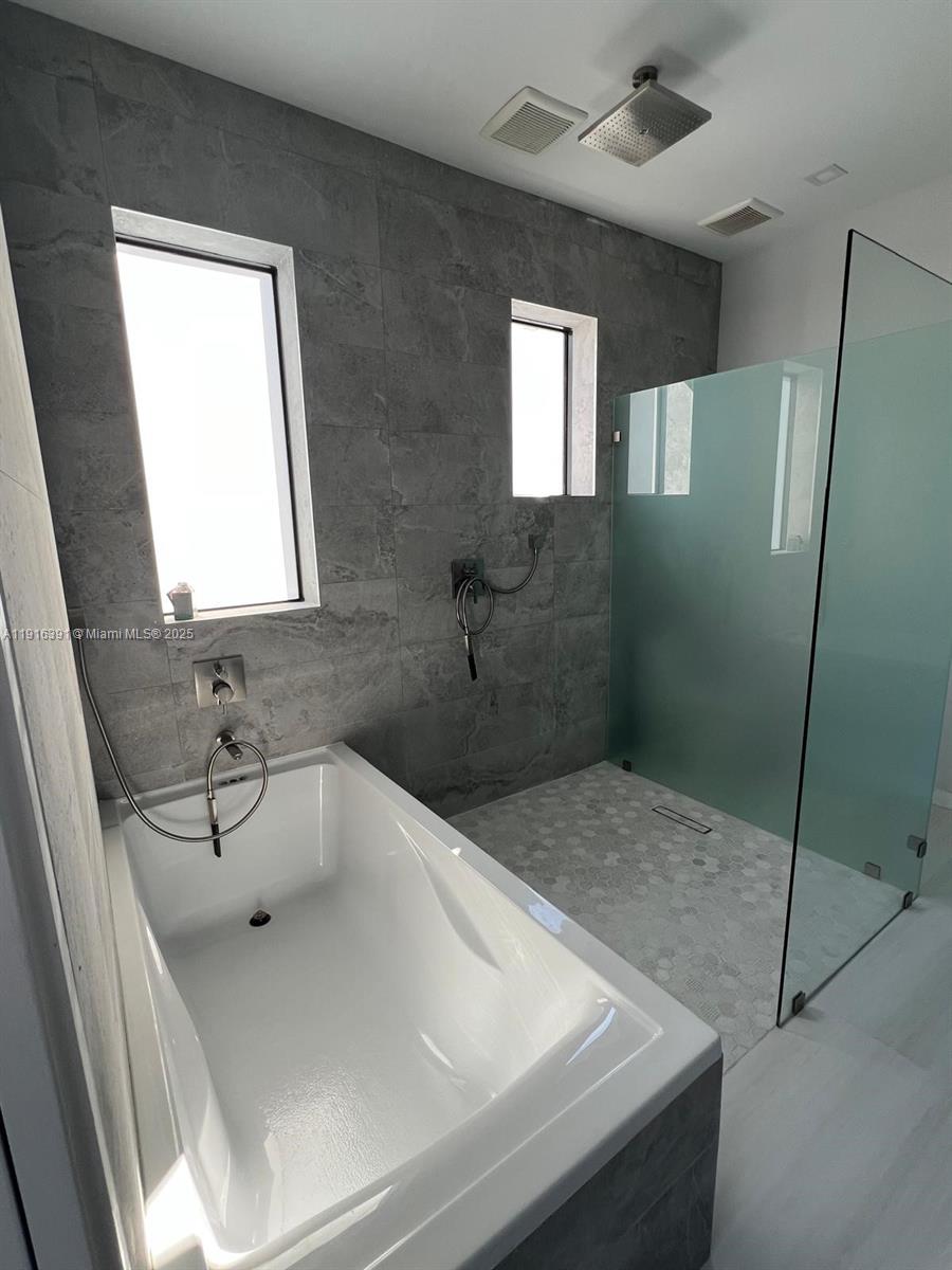 1531 Southwest 22nd Terrace Miami, FL 33145 - Photo 23 of 29 a bathroom with a sink and mirror