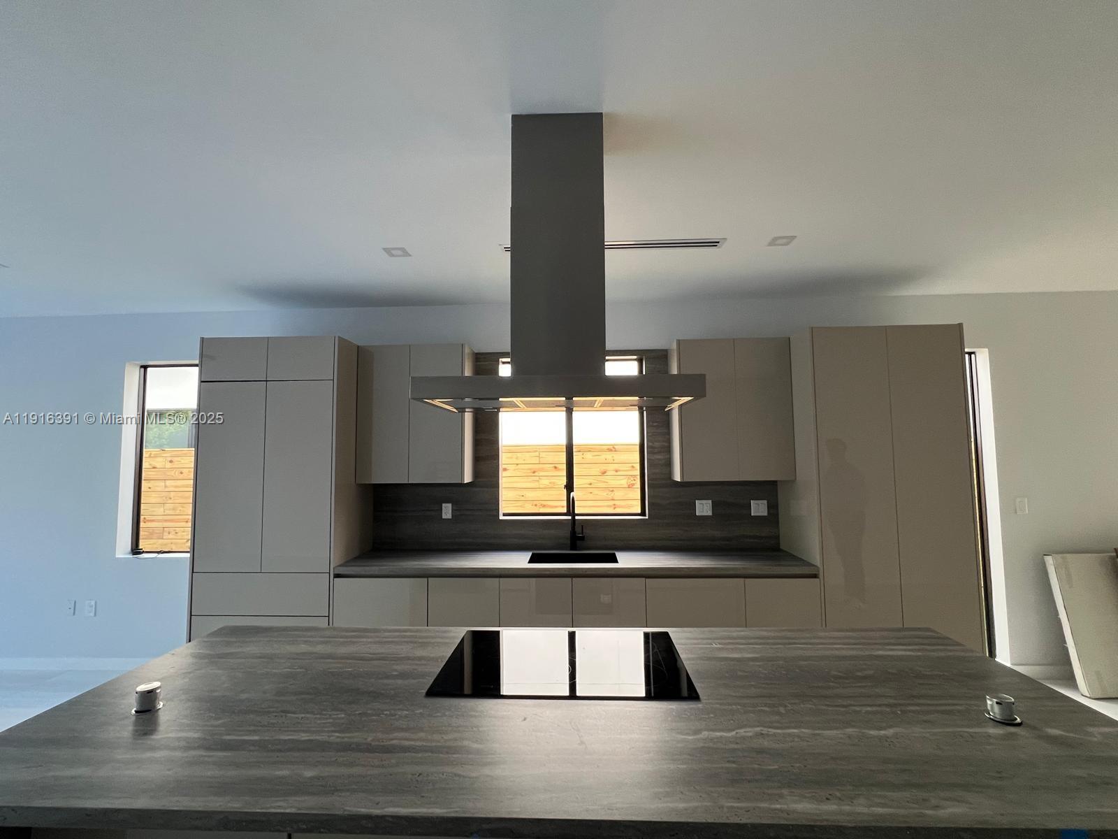 1531 Southwest 22nd Terrace Miami, FL 33145 - Photo 4 of 29 a view of room with window and wooden floor