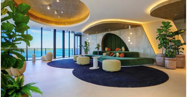 a view of a living room and dining room