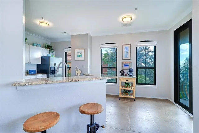 a view of a livingroom with furniture and a table