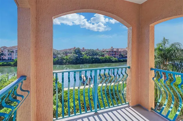 a view of a balcony with wooden floor