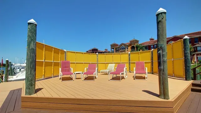 an aerial view of house with yard swimming pool and outdoor seating