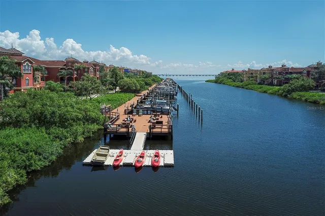 an aerial view of a houses with outdoor space