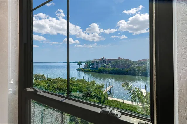 a view of a lake from a window