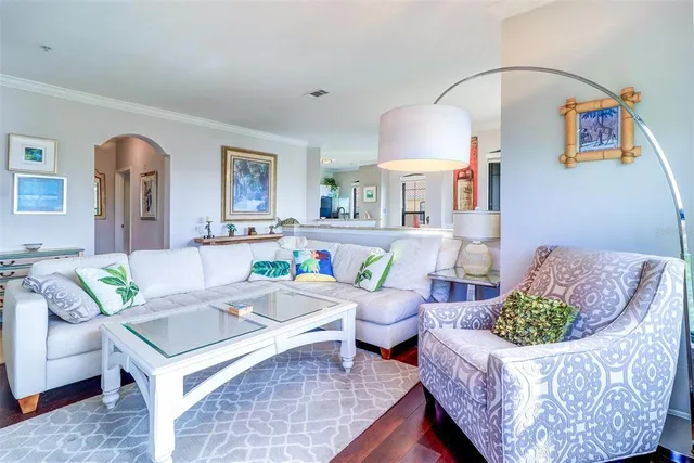 a living room with furniture and a table