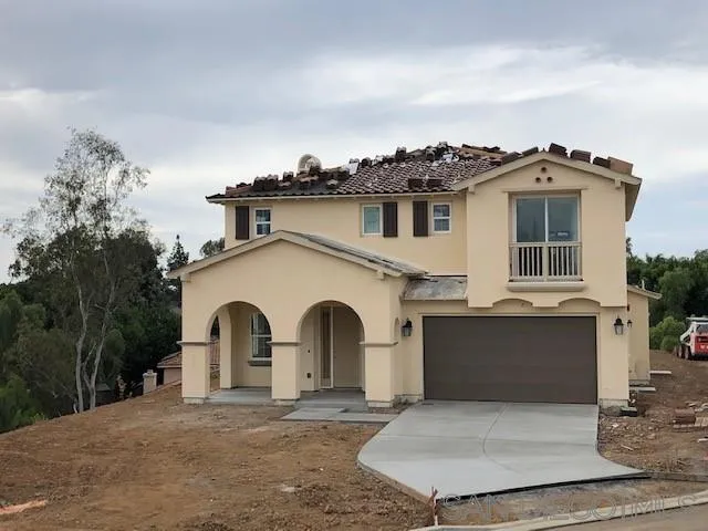 8304 The Grant Place Bonita, CA 91902 - Photo 2 of 7 a white building with a outdoor space