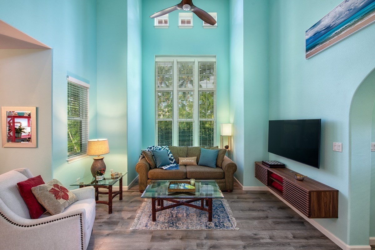 Colony Villas 106. A visual treat with high ceilings, entry archway, lots of light.