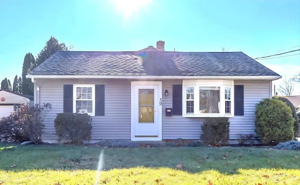 a view of a house with a yard