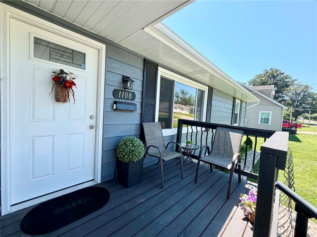 1108 South 3rd Street Effingham, IL 62401 - Photo 27 of 29 a view of a porch with wooden floor and furniture