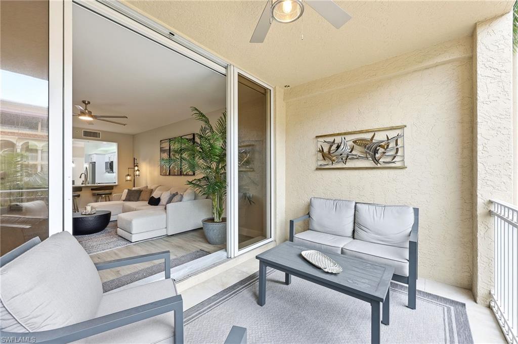401 Bayfront Place, Unit 3307 Naples, FL 34102 - Photo 21 of 28 Balcony with ceiling fan and outdoor lounge area