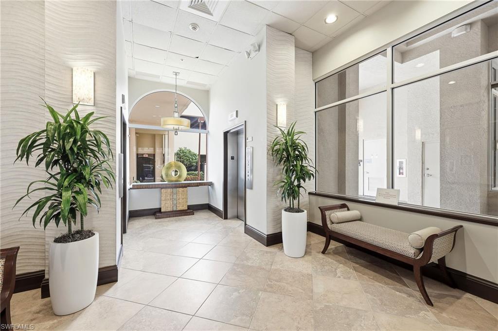 401 Bayfront Place, Unit 3307 Naples, FL 34102 - Photo 22 of 28 Building lobby featuring a paneled ceiling and a high ceiling