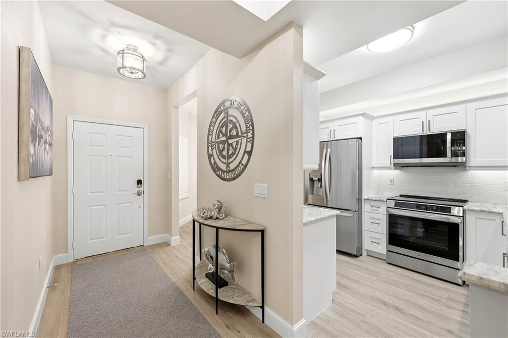 401 Bayfront Place, Unit 3307 Naples, FL 34102 - Photo 7 of 28 Foyer with light wood-style flooring