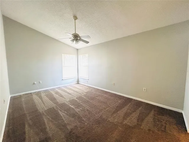 a bathroom with a glass door shower