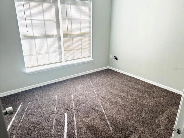 a view of back yard of the house