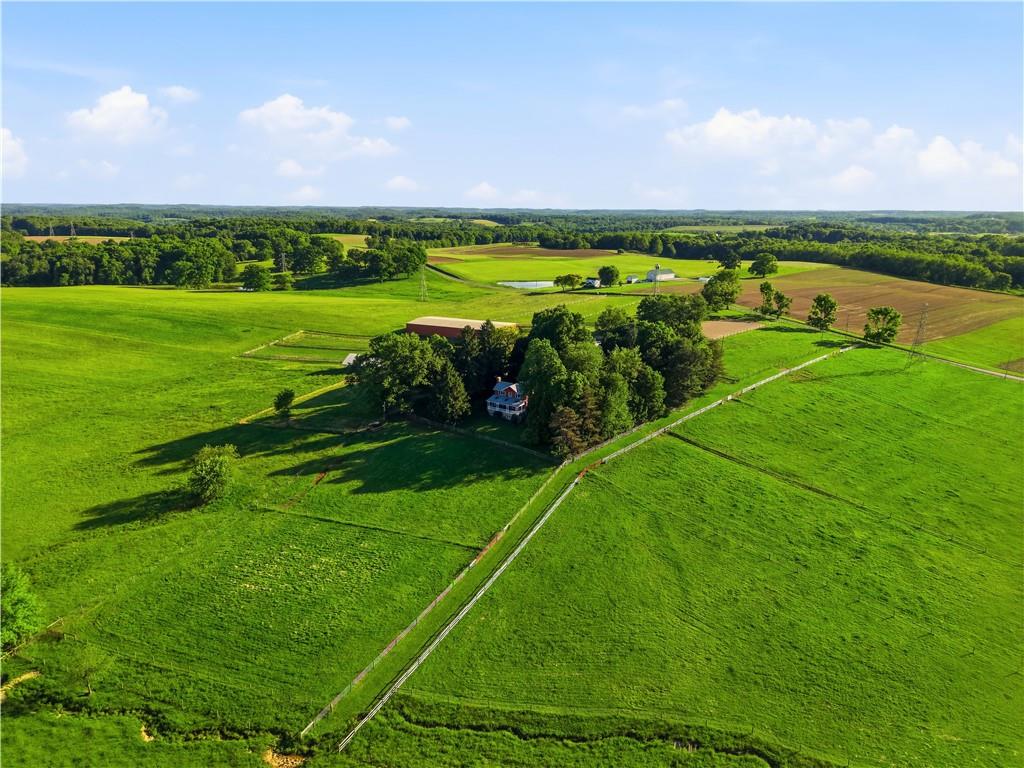 121 Brewer Road Saxonburg, PA 16056 - Photo 45 of 49 a view of a golf course with a lake