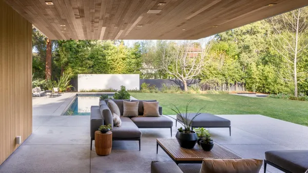 a outdoor living space with furniture and garden view