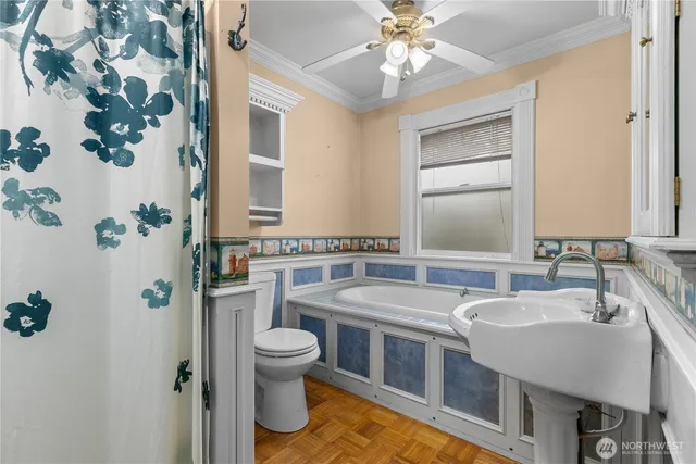 a spacious bathroom with a sink and a mirror