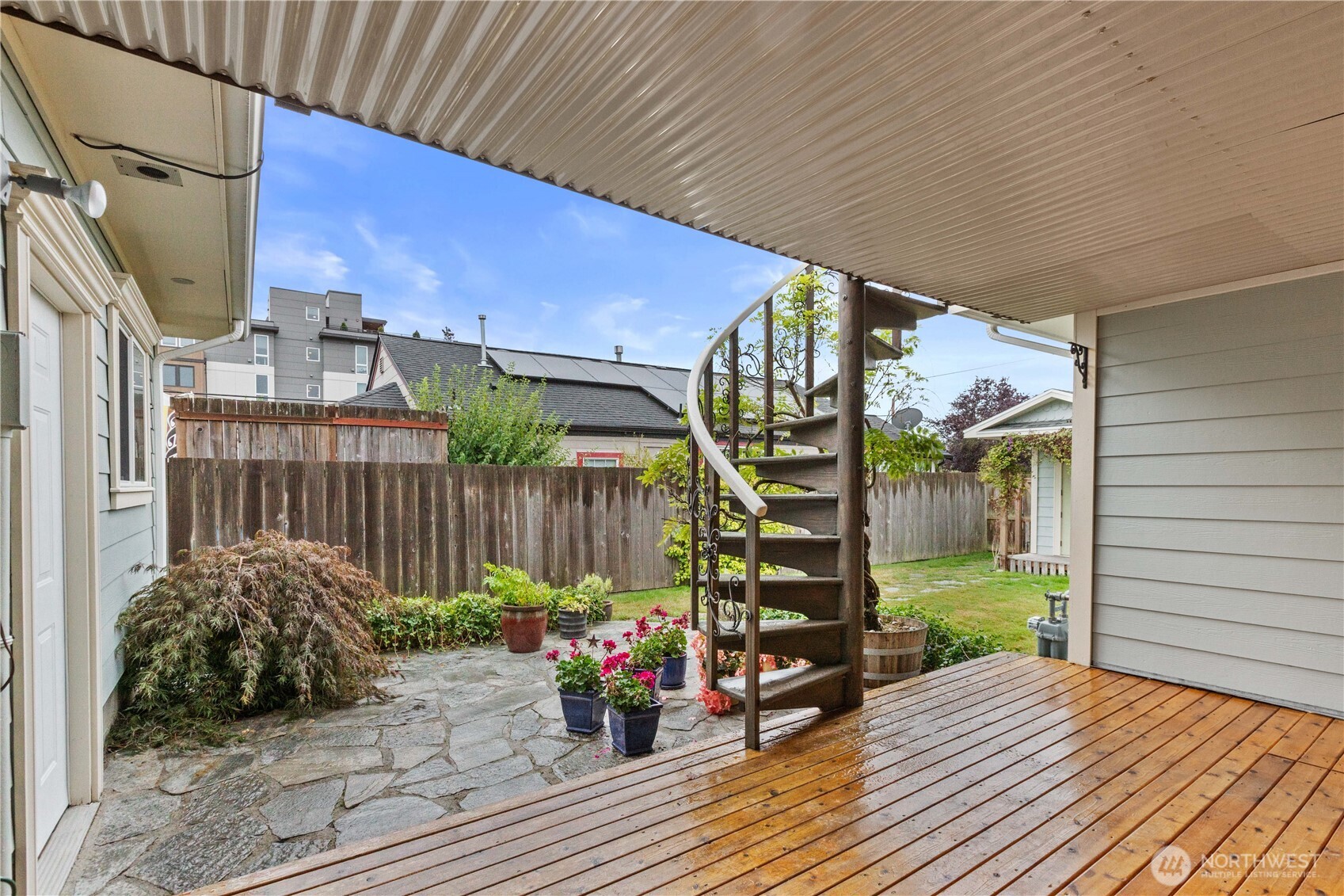 1108 18th Street Anacortes, WA 98221 - Photo 23 of 37 a view of a backyard with sitting area