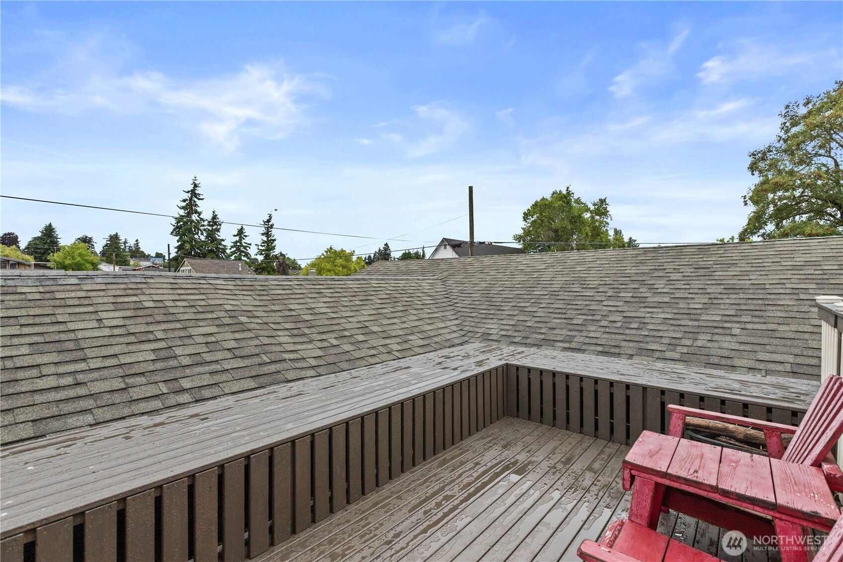 1108 18th Street Anacortes, WA 98221 - Photo 28 of 37 a balcony with wooden floor and city view