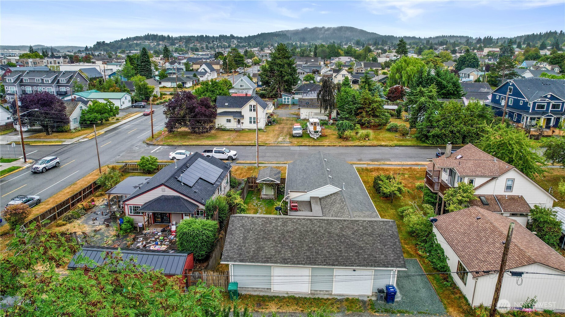 1108 18th Street Anacortes, WA 98221 - Photo 32 of 37 an aerial view of residential houses with outdoor space and swimming pool