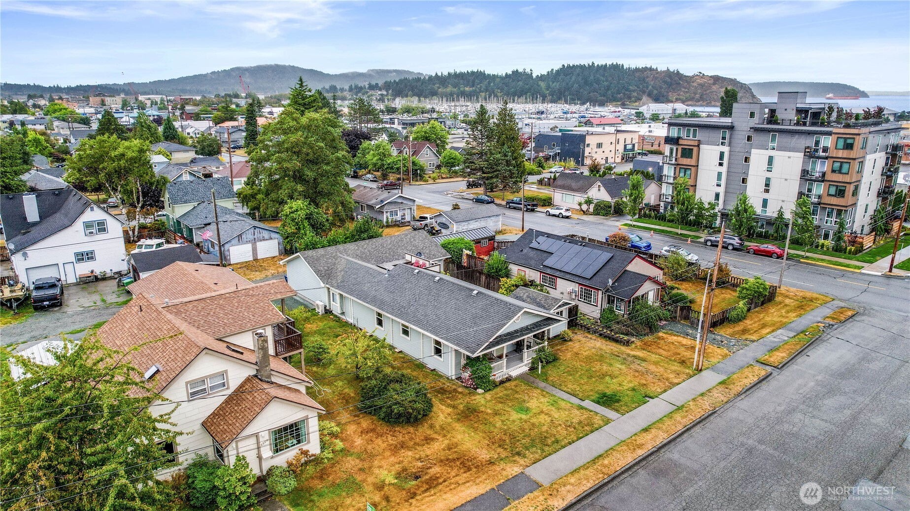 1108 18th Street Anacortes, WA 98221 - Photo 34 of 37 an aerial view of residential houses with outdoor space and river view