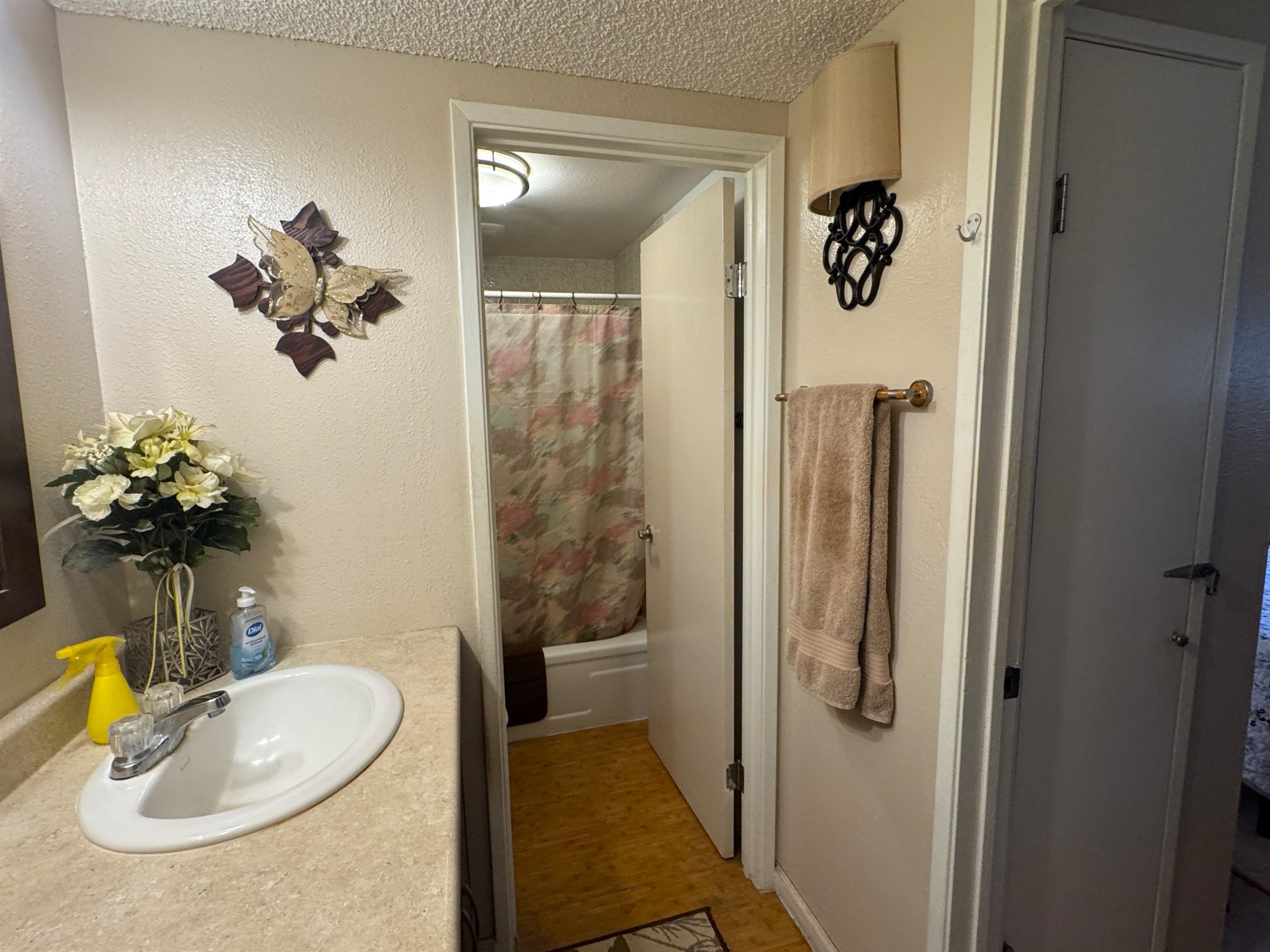 Kamehameha V Highway, Unit 123B Kaunakakai, HI 96748 - Photo 18 of 25 a bathroom with a sink toilet and shower