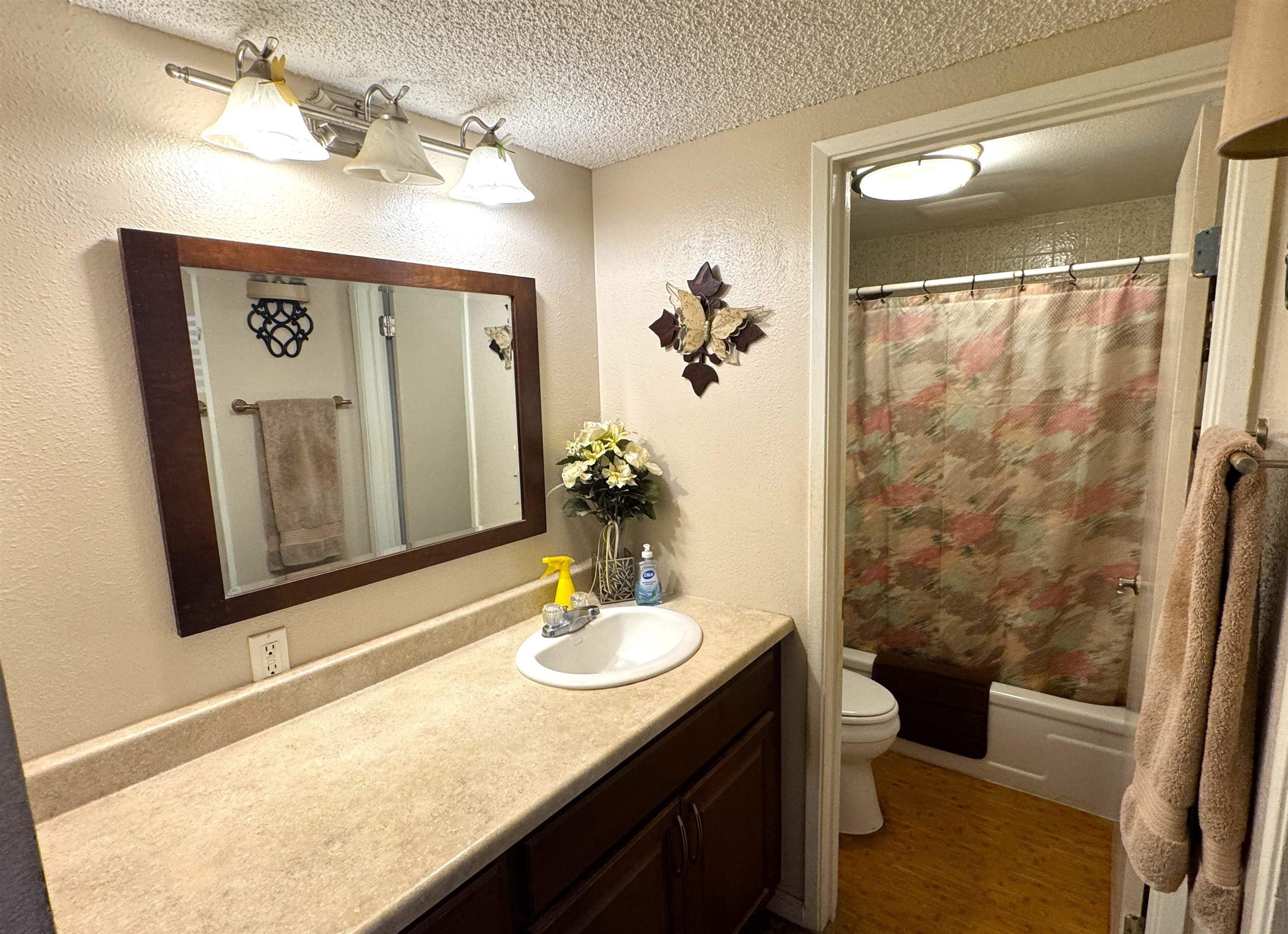 Kamehameha V Highway, Unit 123B Kaunakakai, HI 96748 - Photo 19 of 25 a bathroom with a sink and a mirror