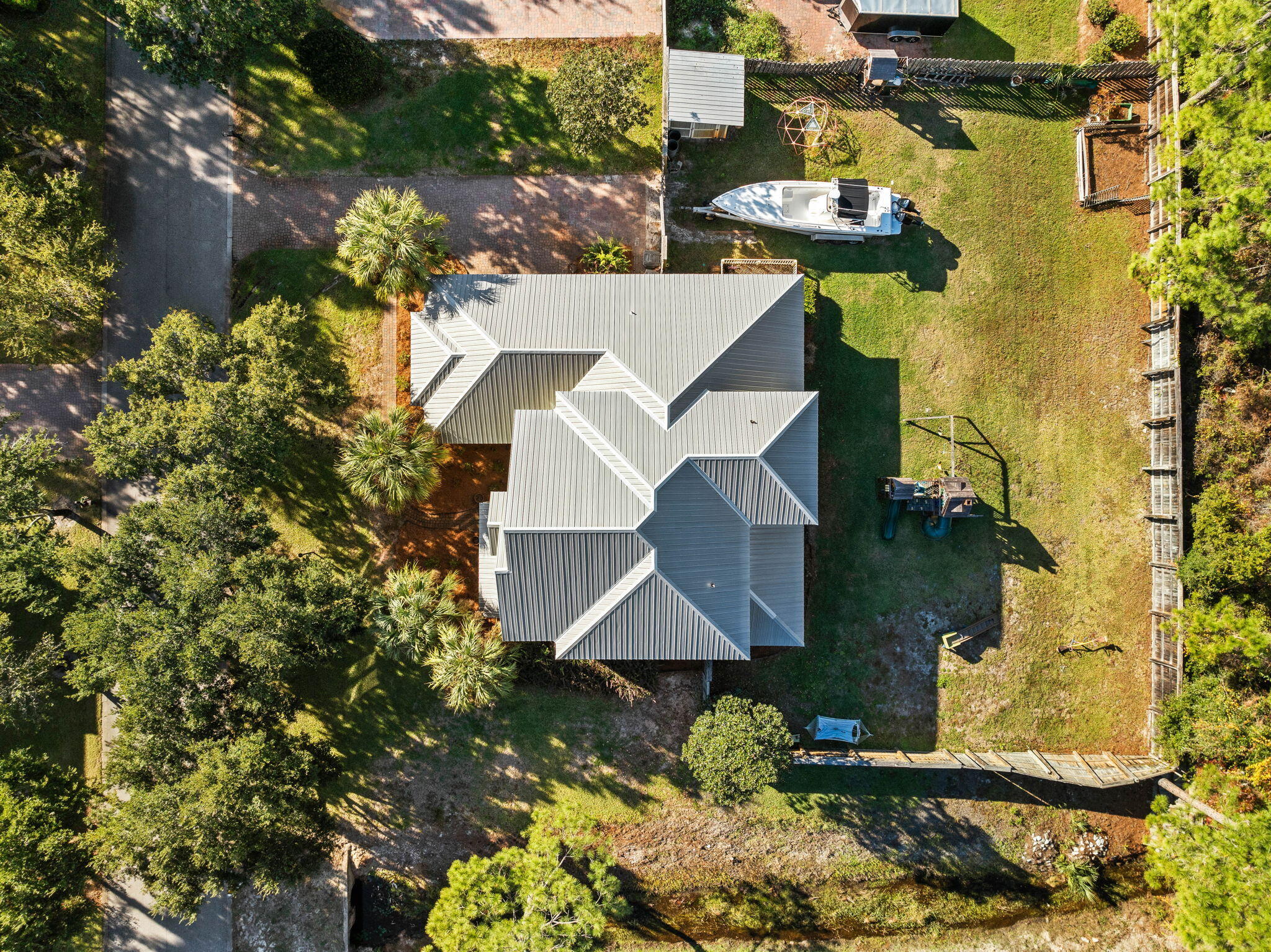 144 Preston Path Santa Rosa Beach, FL 32459 - Photo 12 of 60 an aerial view of a house with swimming pool and garden
