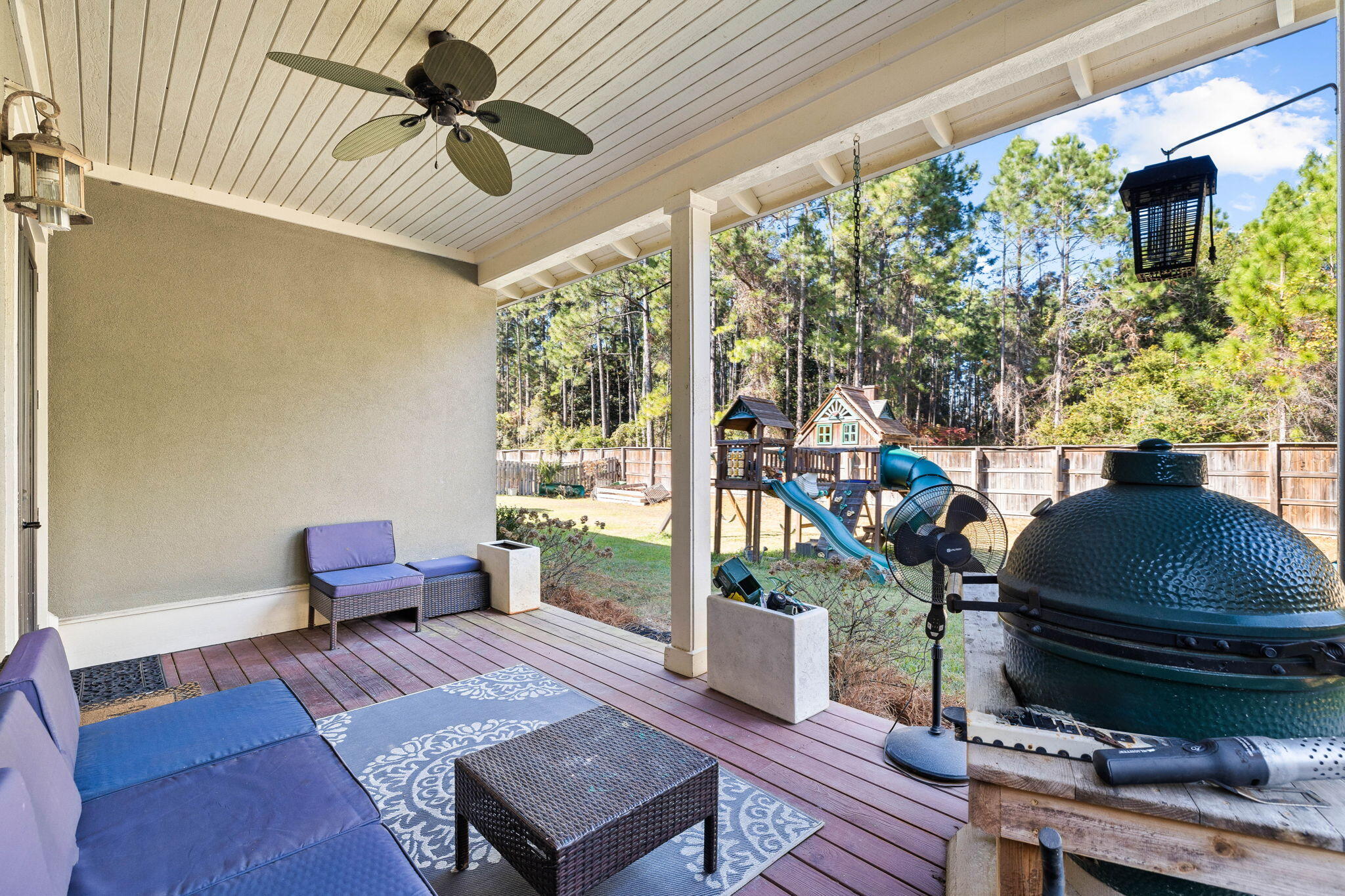 144 Preston Path Santa Rosa Beach, FL 32459 - Photo 19 of 60 a living room with furniture and a floor to ceiling window