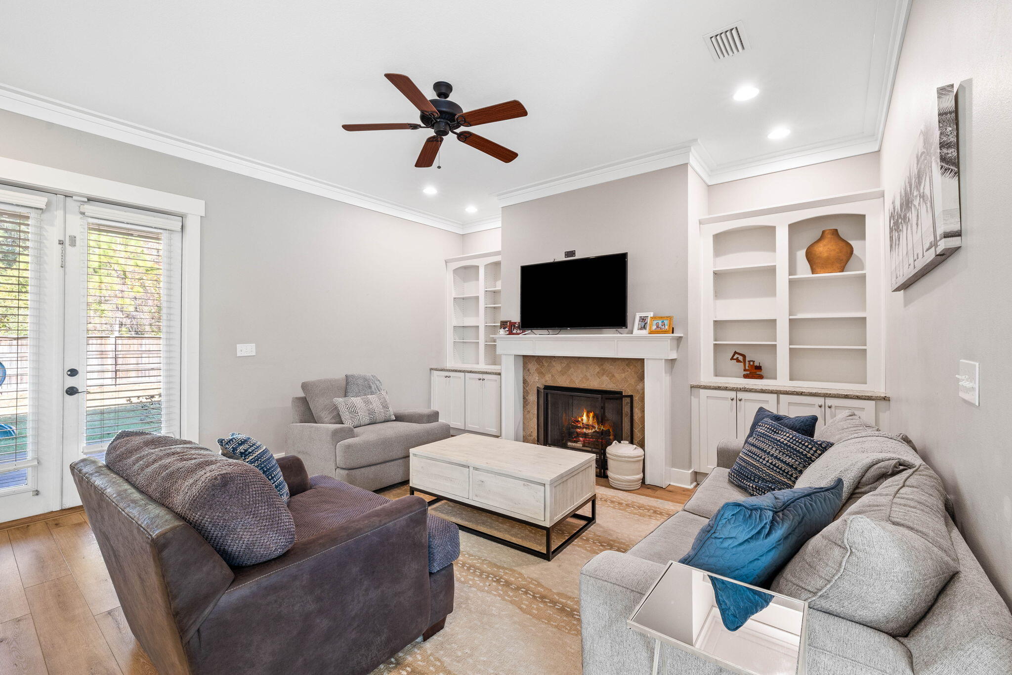 144 Preston Path Santa Rosa Beach, FL 32459 - Photo 27 of 60 a living room with furniture a flat screen tv and a fireplace