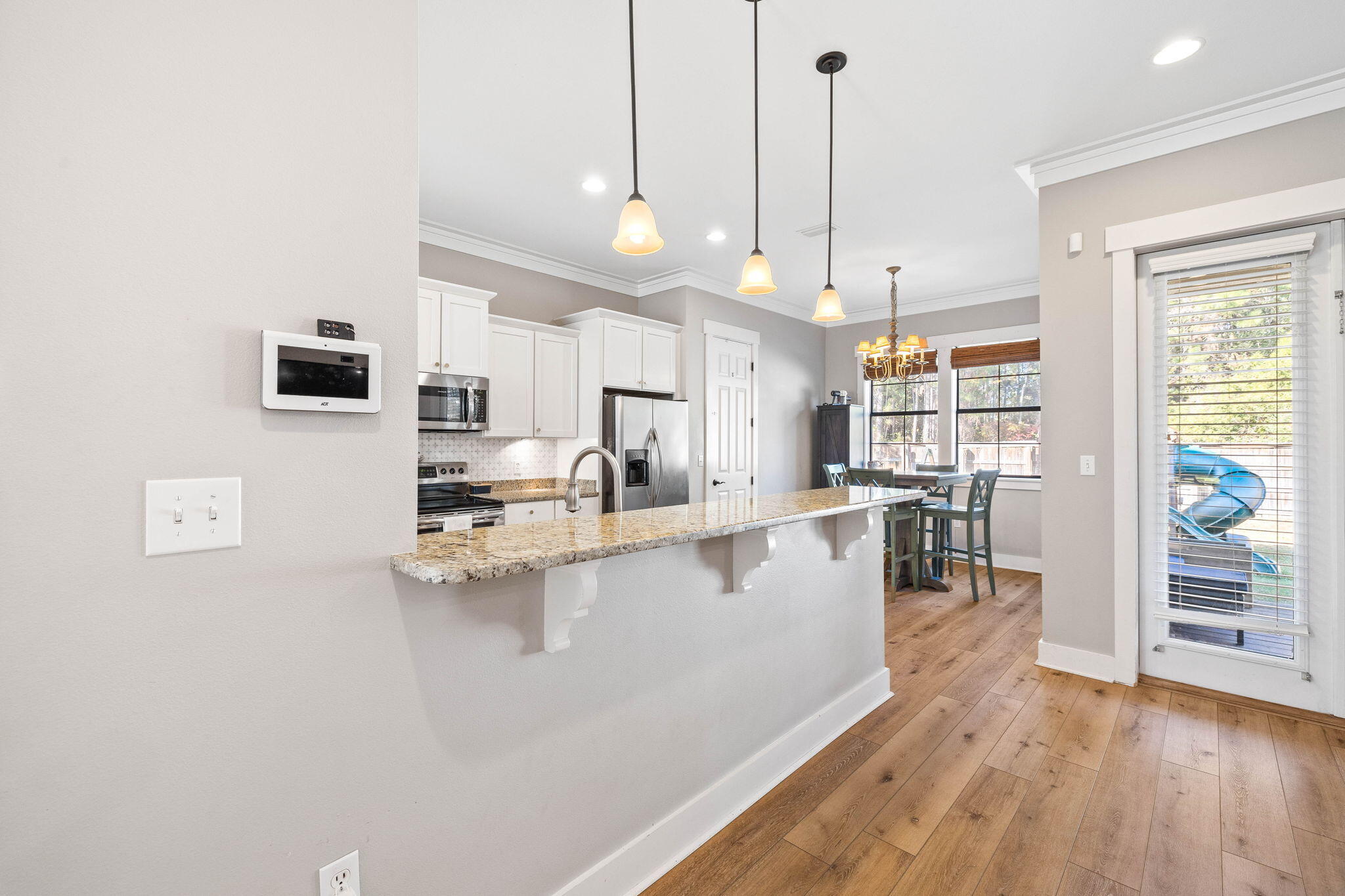 144 Preston Path Santa Rosa Beach, FL 32459 - Photo 30 of 60 a kitchen with counter top space and wooden floor