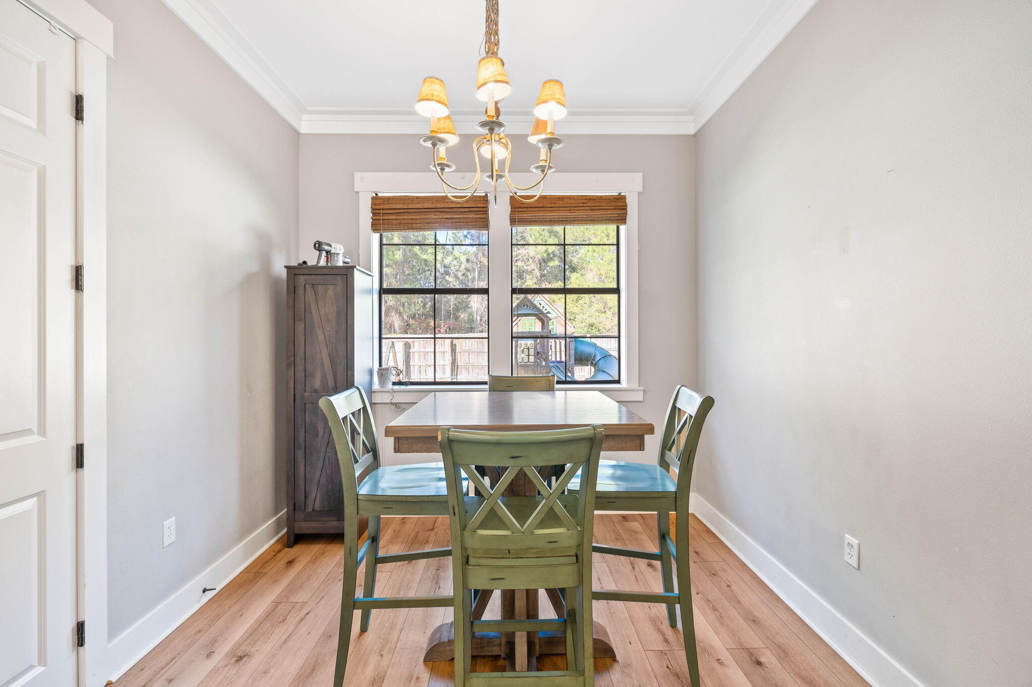 144 Preston Path Santa Rosa Beach, FL 32459 - Photo 39 of 60 a view of a dining room with furniture and chandelier